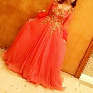 Indian/ Pakistani wedding or party gown. Color is closer to the second pic